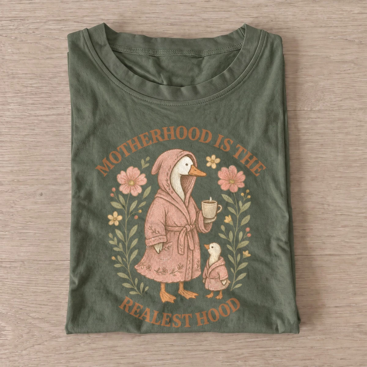 Motherhood is the realest hood goose t shirt olive20motherhood goose.webp