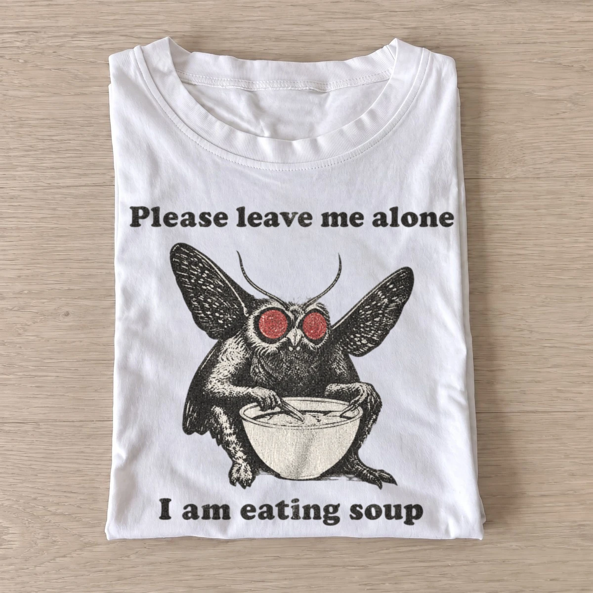 Mothman please leave me alone i am eating soup t shirt white20mothman soup.webp