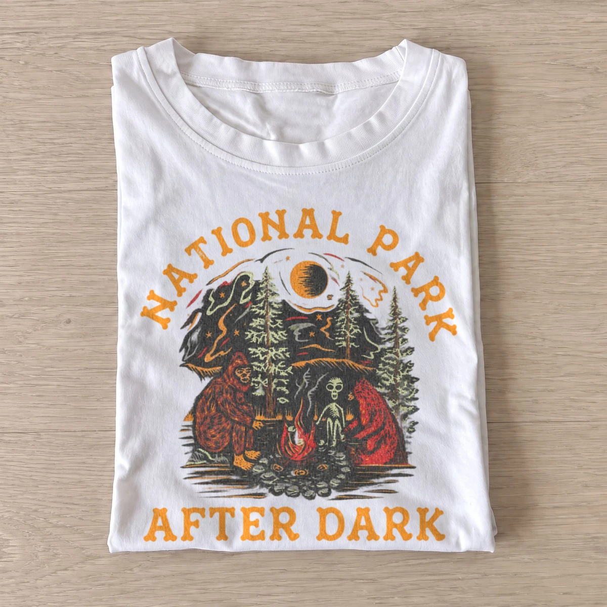 National park after dark bigfoot campfire t shirt white20parks after dark.webp