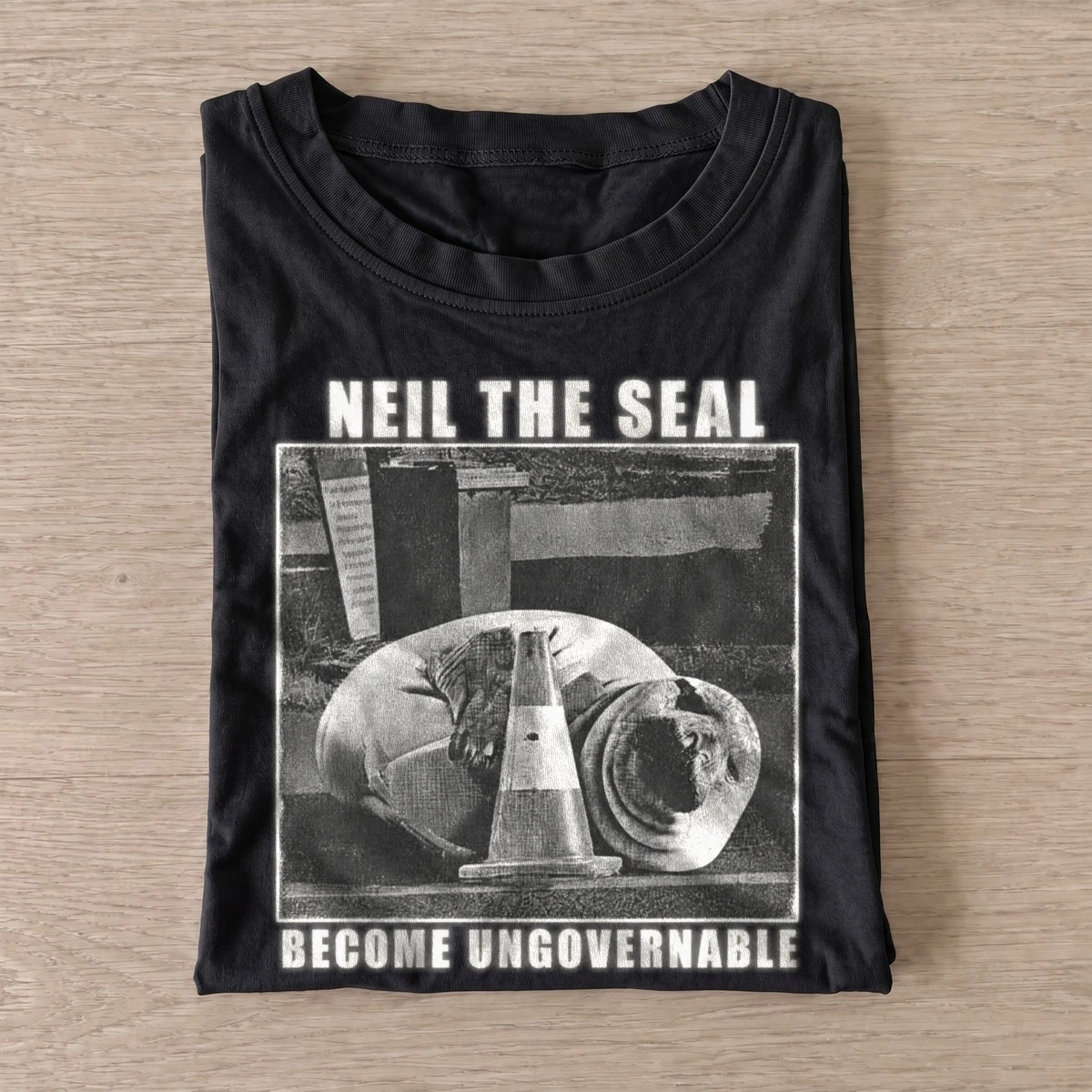 Neil the seal become ungovernable t shirt black20ungovernable seal.webp