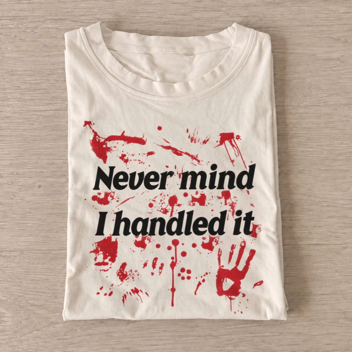 Never mind i handled it bloody t shirt sand20handled it.webp