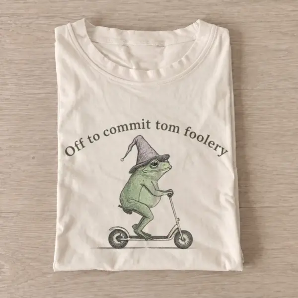 Off to commit tomfoolery scooter frog t shirt sand20tomfoolery scooter frog.webp