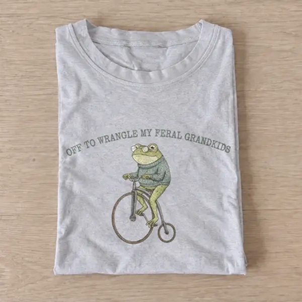 Off to wrangle my feral grandkids frog t shirt gray20grandkid wrangling frog.webp