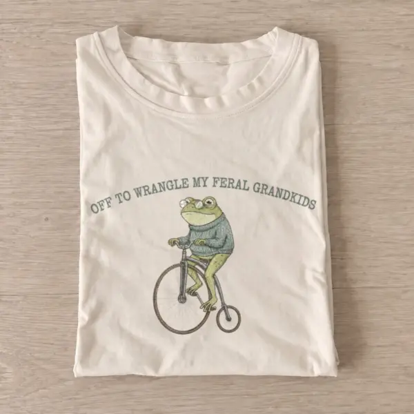 Off to wrangle my feral grandkids frog t shirt sand20grandkid wrangling frog.webp