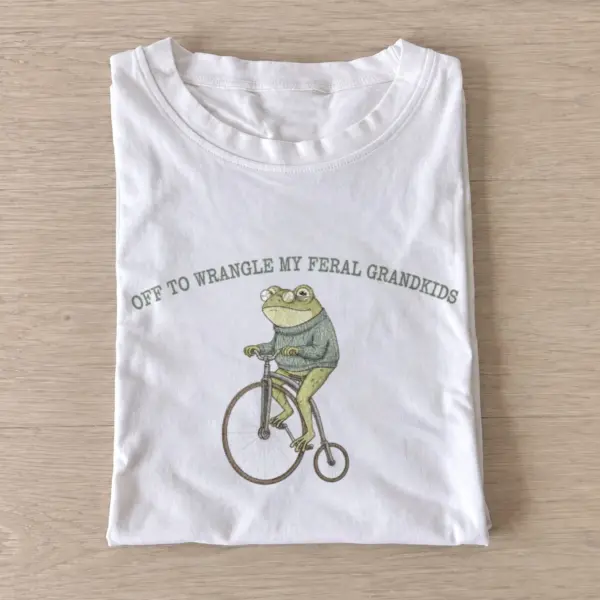 Off to wrangle my feral grandkids frog t shirt white20grandkid wrangling frog.webp