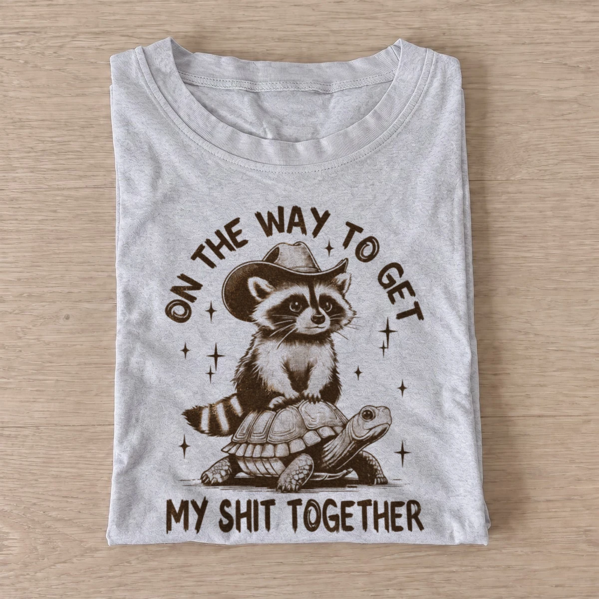 On the way to get my shit together raccoon t shirt gray20raccoon turtle journey.webp