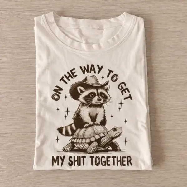 On the way to get my shit together raccoon t shirt sand20raccoon turtle journey.webp