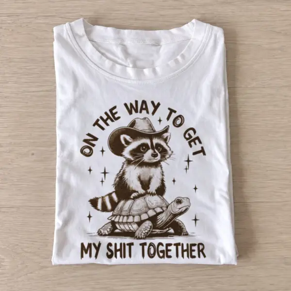 On the way to get my shit together raccoon t shirt white20raccoon turtle journey.webp
