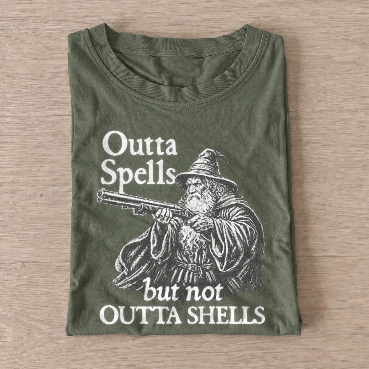 Outta spells but not outta shells wizard t shirt olive20wizard with shells.webp