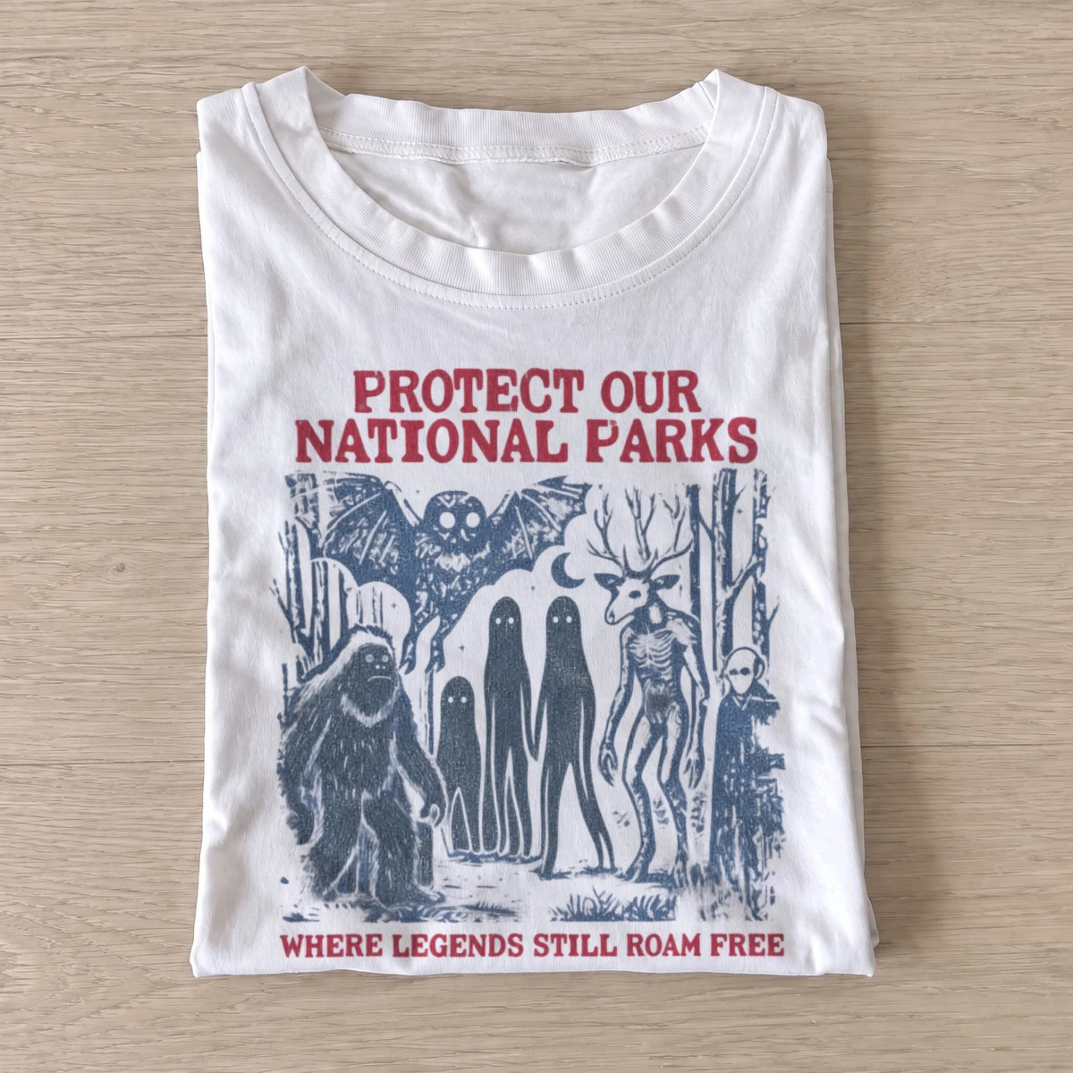 Protect our national parks cryptids t shirt white20protect parks cryptids blue.webp