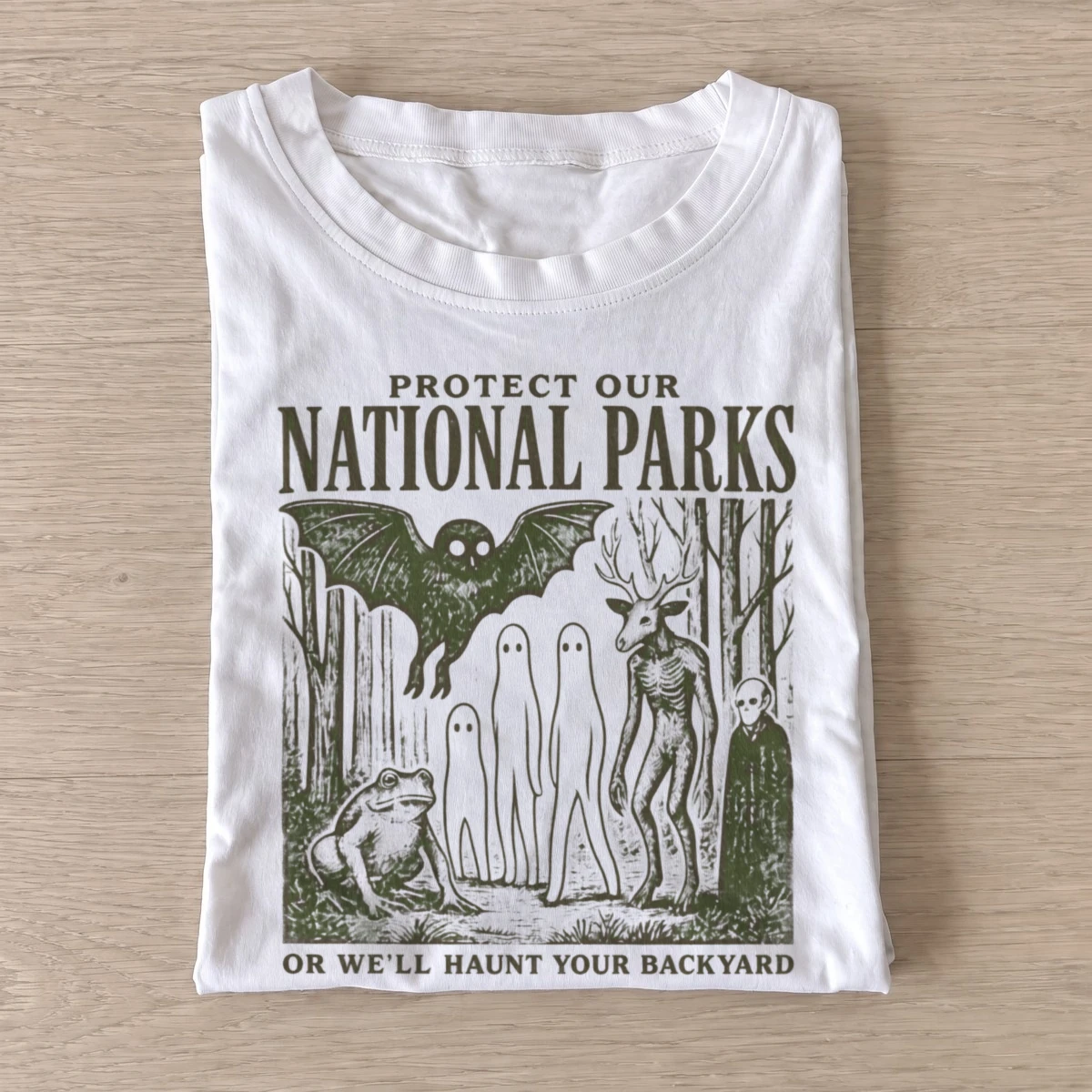 Protect our national parks cryptids t shirt white20protect parks cryptids green.webp