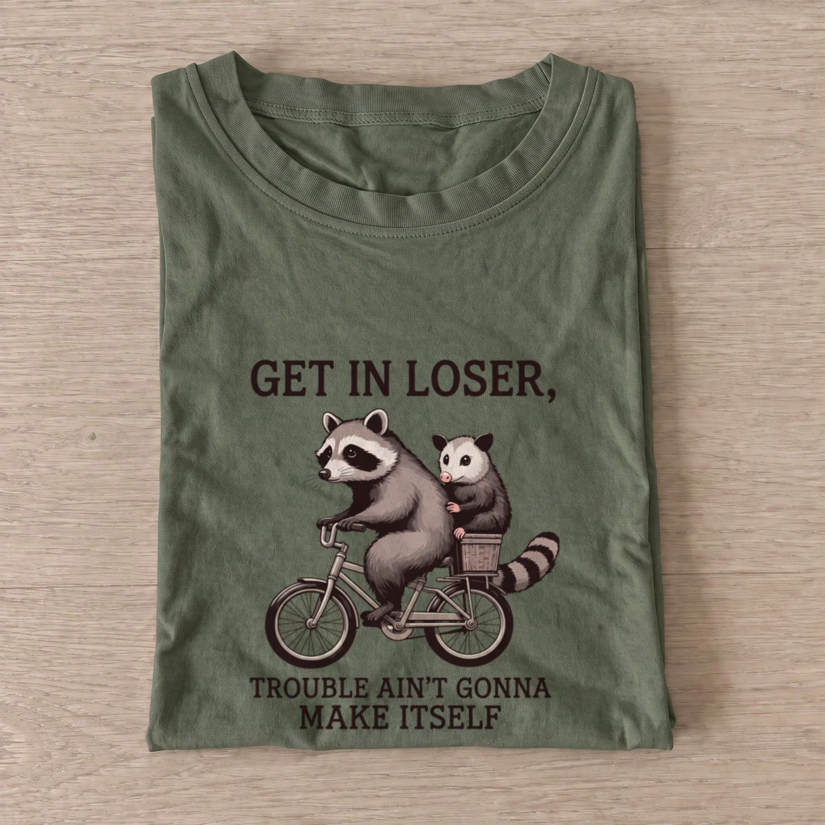 Raccoon opossum bicycle t shirt olive20raccoon opossum bicycle.webp