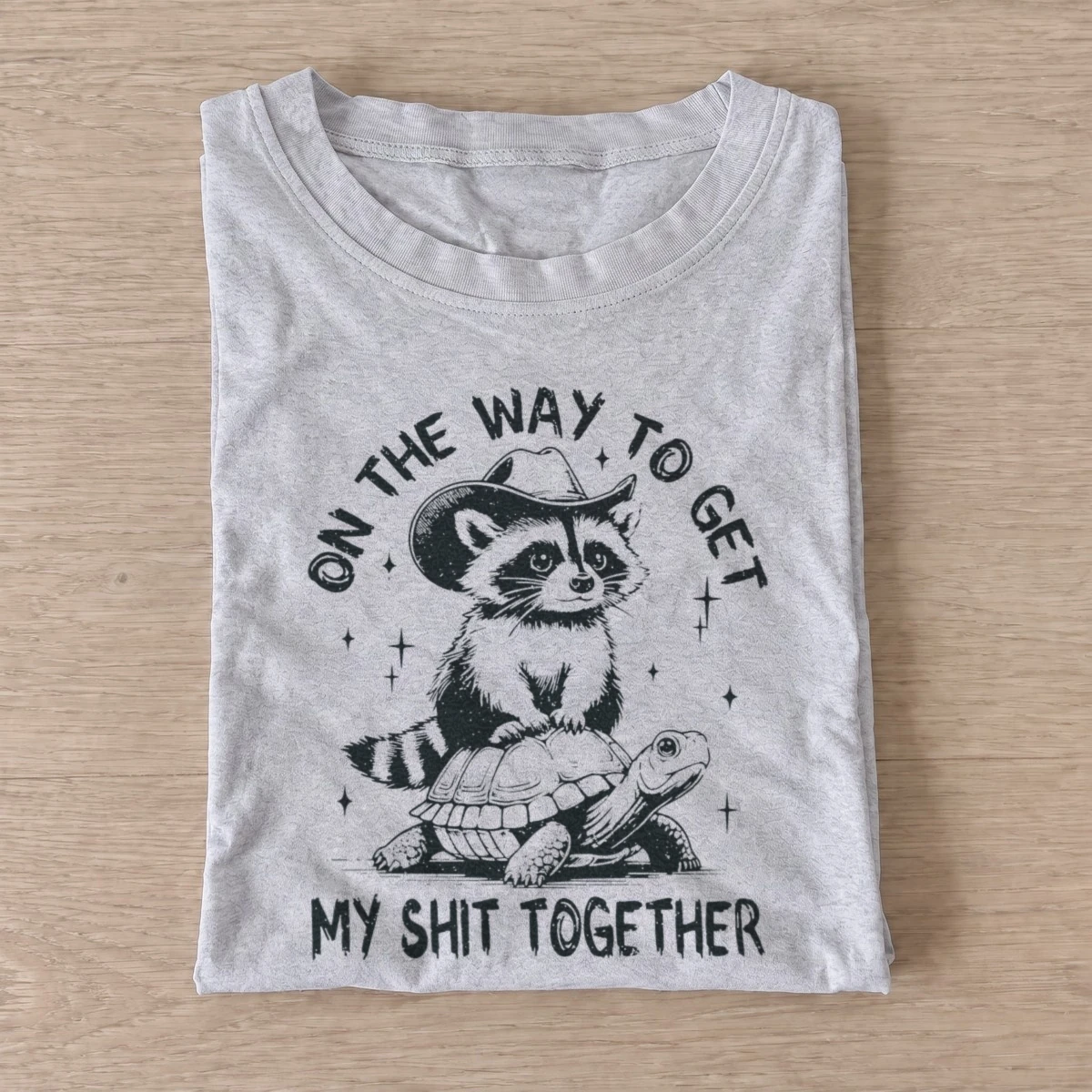 Raccoon turtle journey t shirt gray20raccoon turtle journey.webp