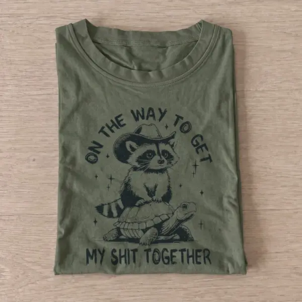 Raccoon turtle journey t shirt olive20raccoon turtle journey.webp