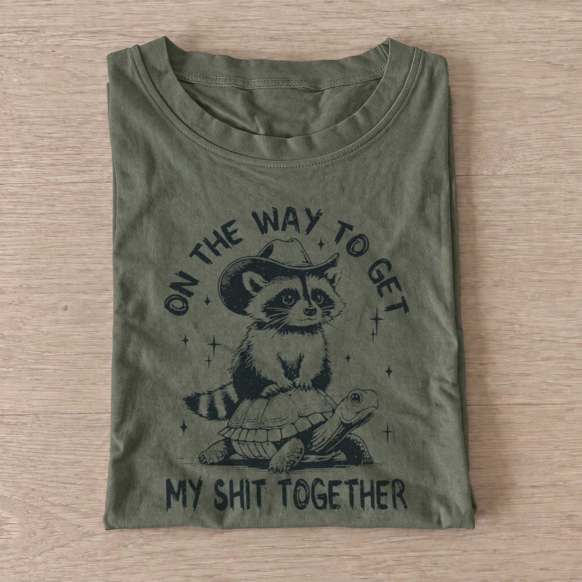 Raccoon turtle journey t shirt olive20raccoon turtle journey.webp