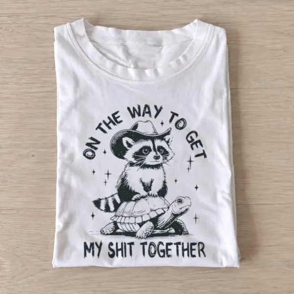 Raccoon turtle journey t shirt white20raccoon turtle journey.webp