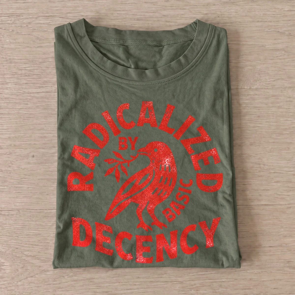 Radicalized by basic decency crow t shirt olive20radical decency crow.webp