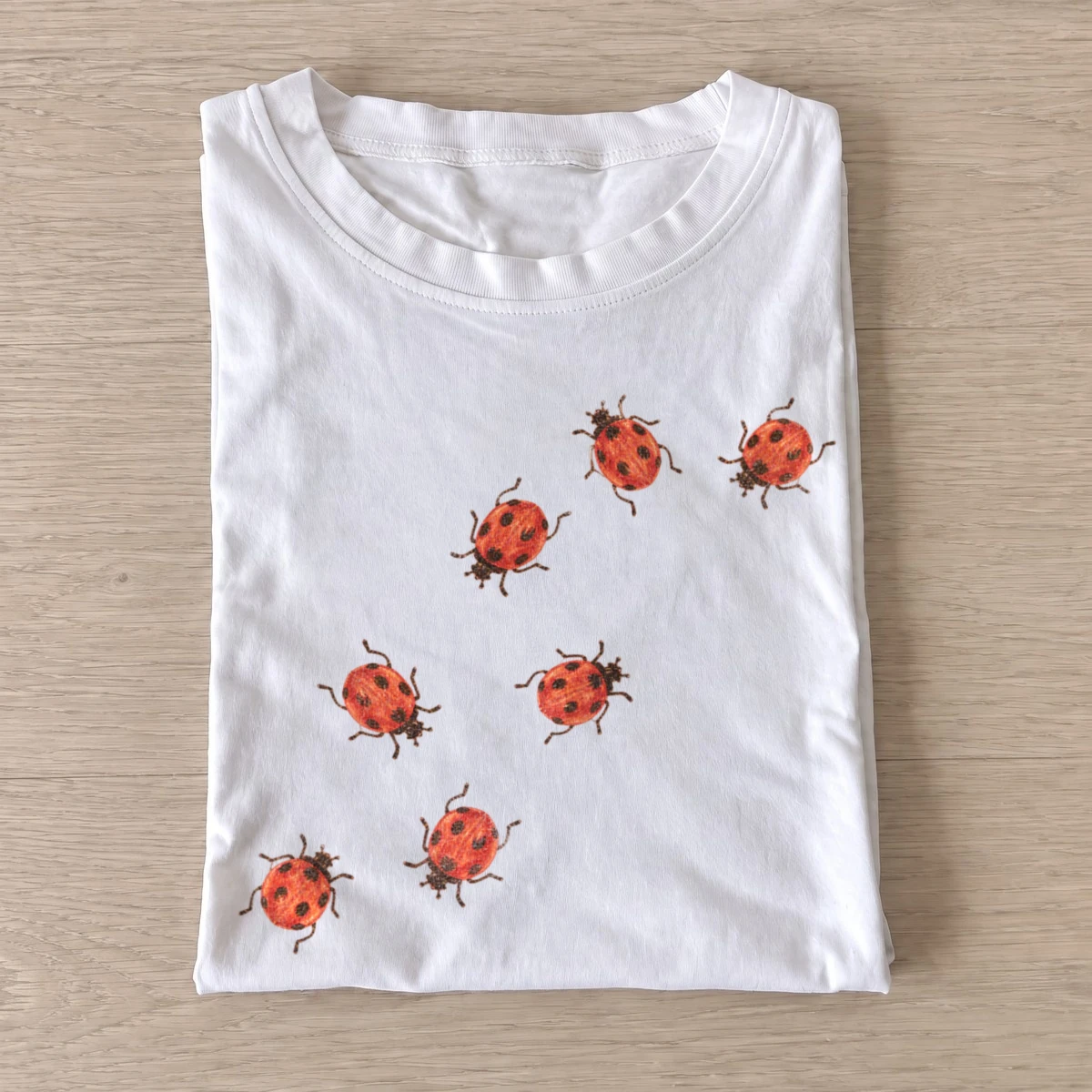 Red ladybug cluster graphic t shirt white20ladybug cluster.webp