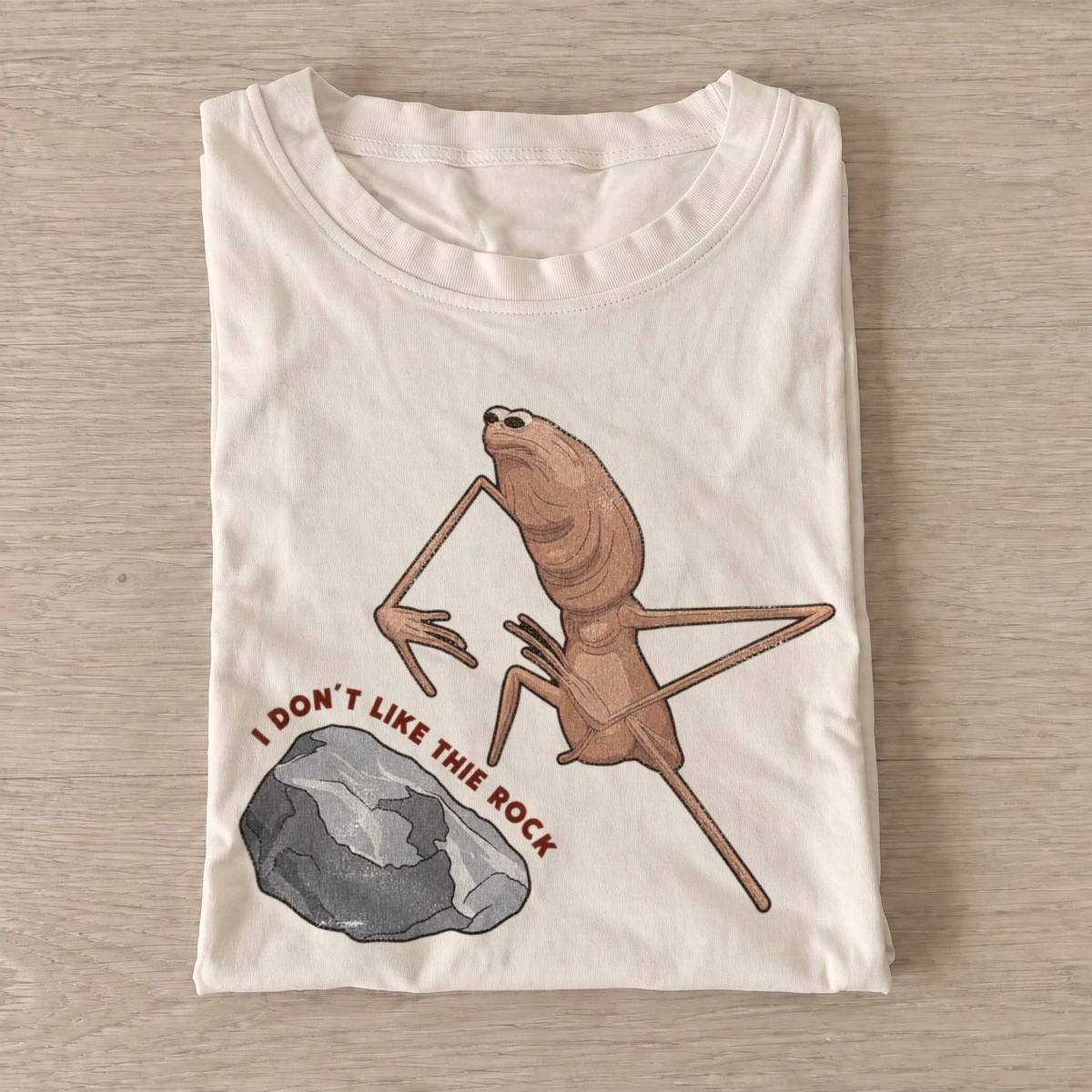 Rock hating frog graphic t shirt sand20rock hating frog.webp