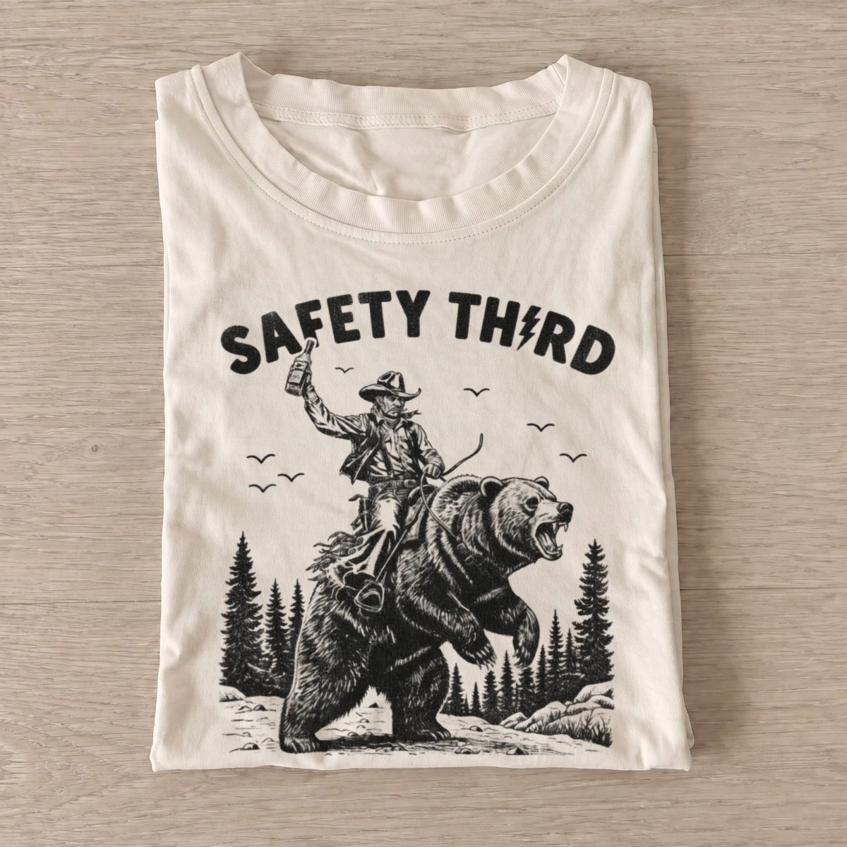 Safety third cowboy riding bear t shirt sand20safety third bear.webp