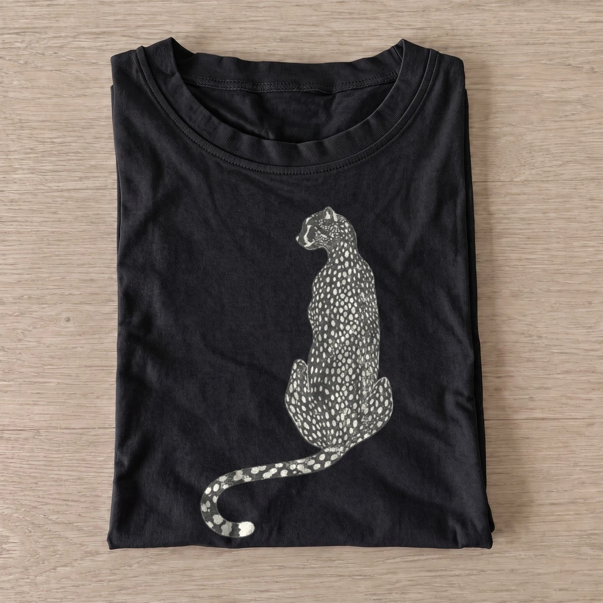 Seated cheetah t shirt black20seated cheetah.webp