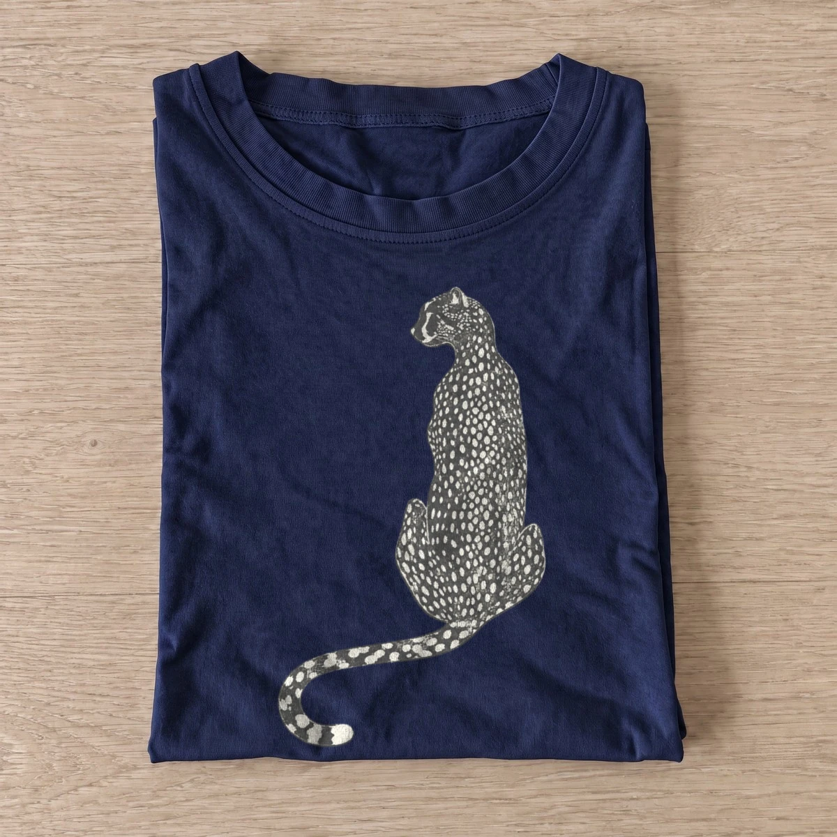 Seated cheetah t shirt navy20seated cheetah.webp