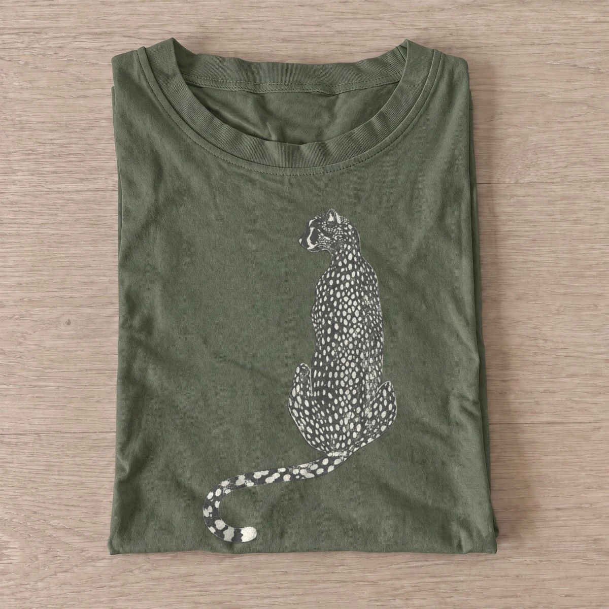 Seated cheetah t shirt olive20seated cheetah.webp