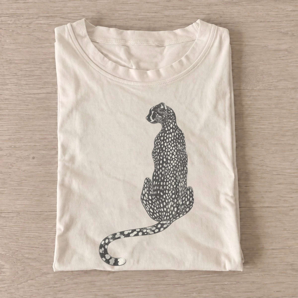 Seated cheetah t shirt sand20seated cheetah.webp