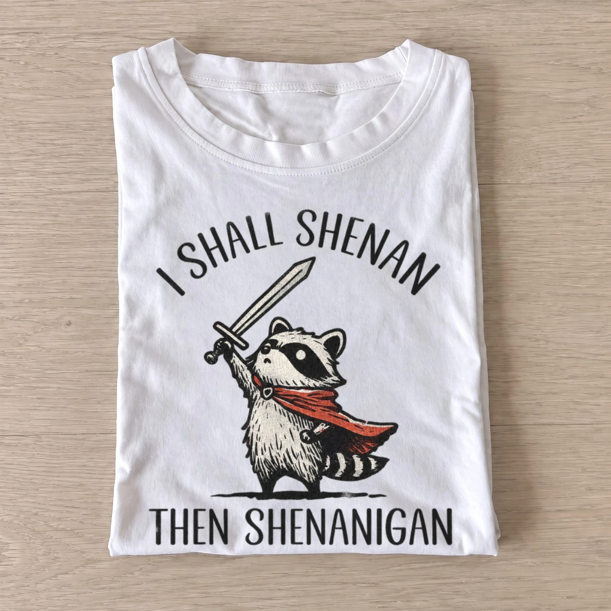 Shenanigan raccoon knight t shirt white20shenanigan raccoon knight.webp
