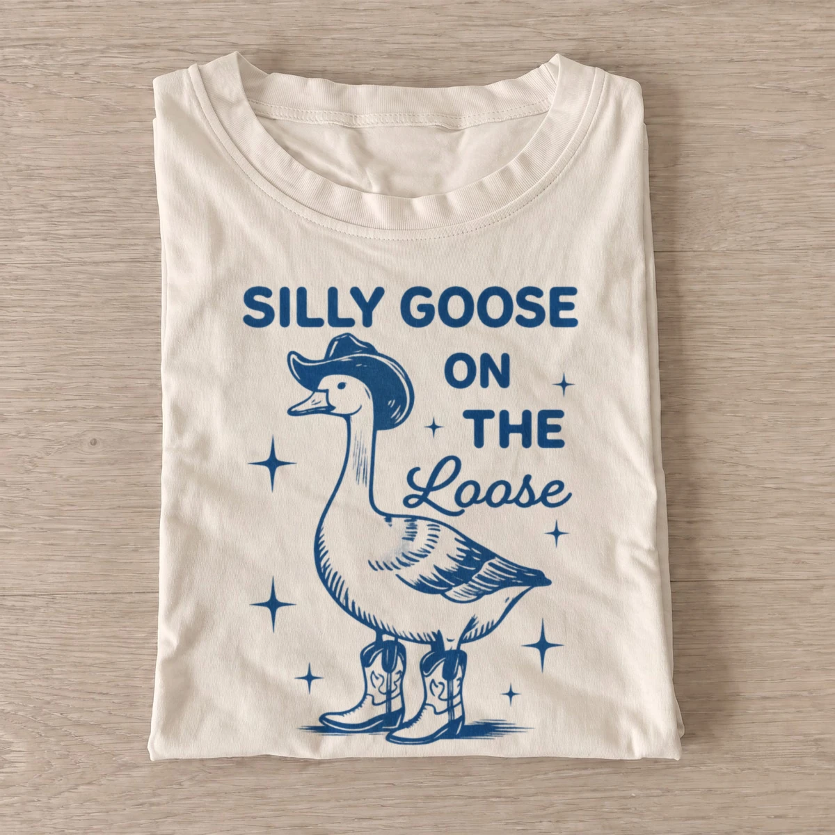 Silly goose on the loose cowboy t shirt sand20silly goose loose.webp