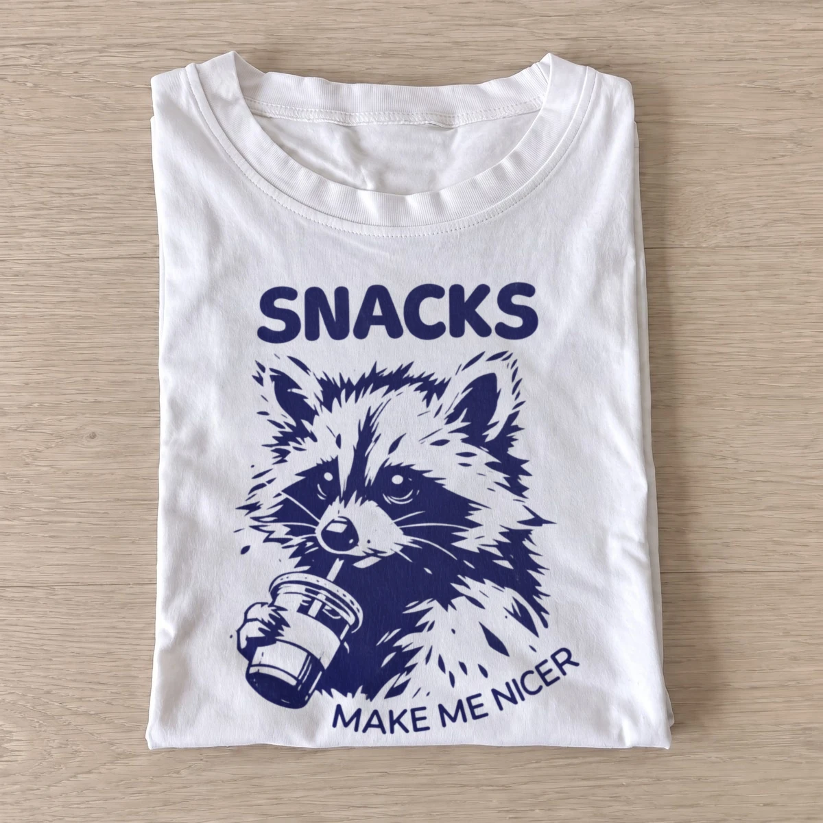 Snacks make me nicer raccoon t shirt white20snacks help raccoon.webp