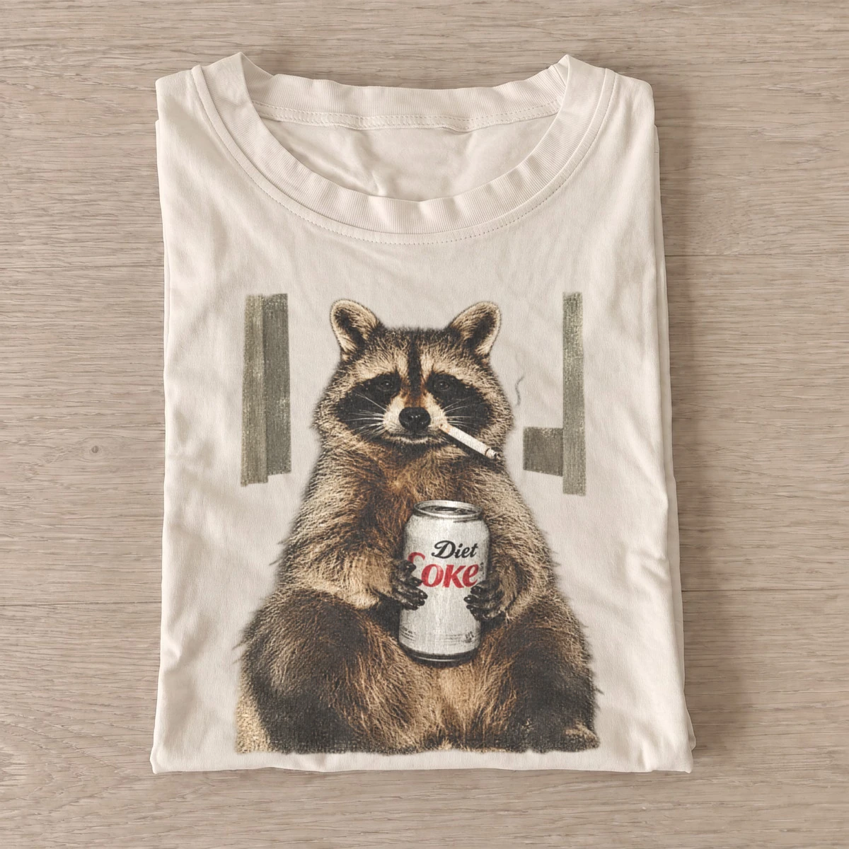 Soda sipping raccoon graphic t shirt sand20soda sipping raccoon.webp