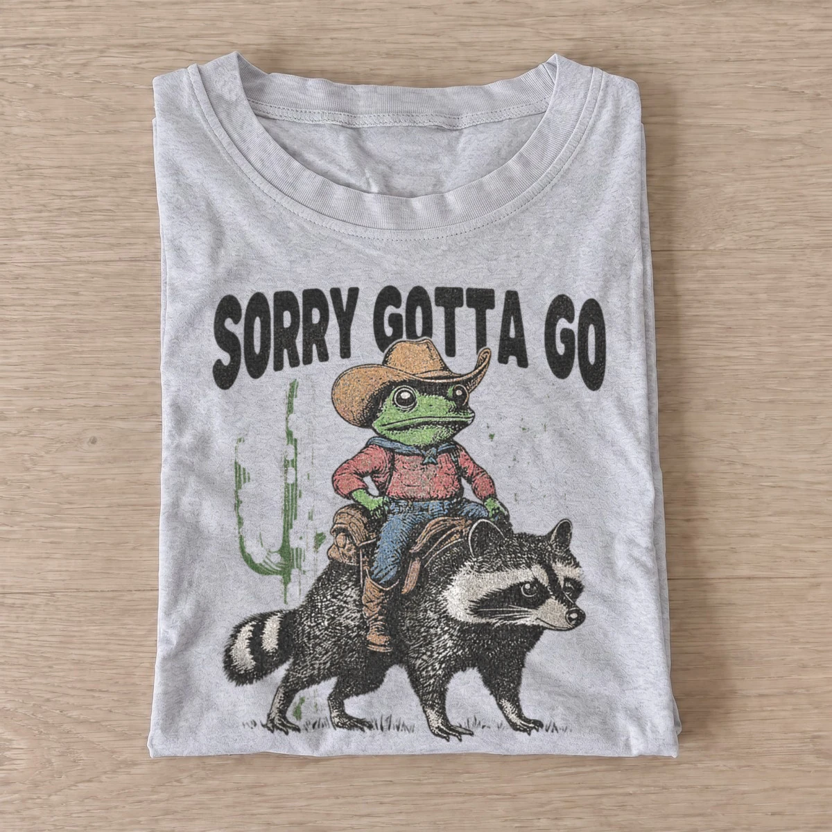 Sorry gotta go cowboy frog raccoon t shirt gray20cowboy frog raccoon.webp