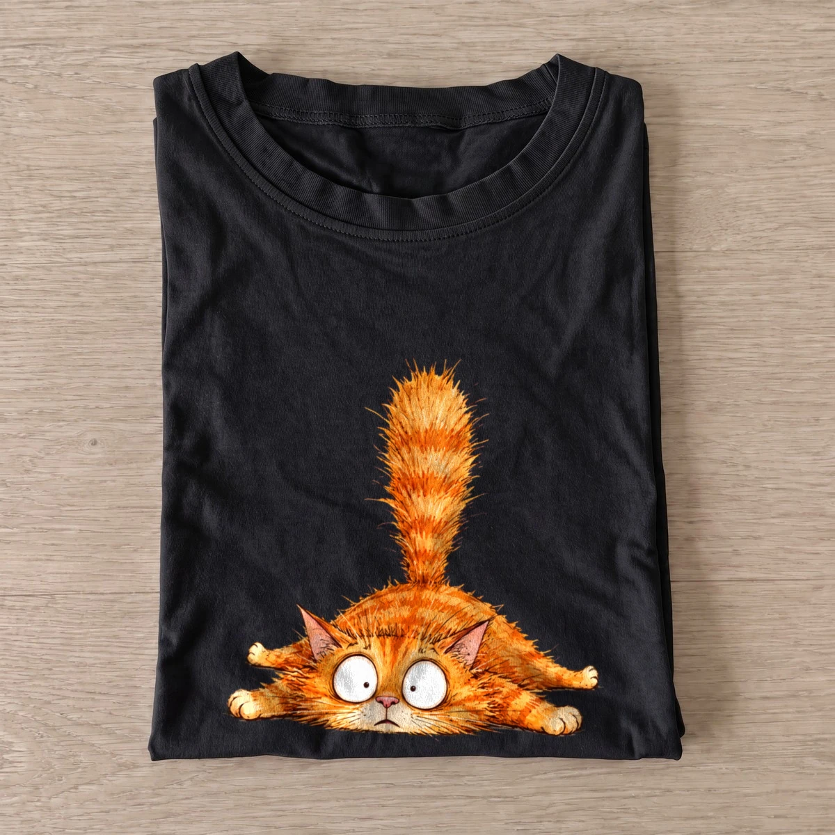 Startled orange cat t shirt black20startled orange cat.webp