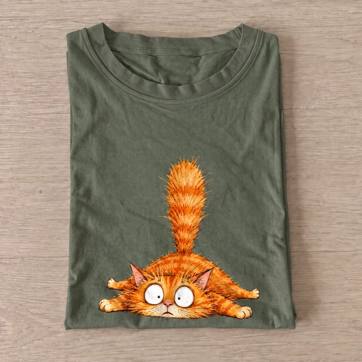 Startled orange cat t shirt olive20startled orange cat.webp