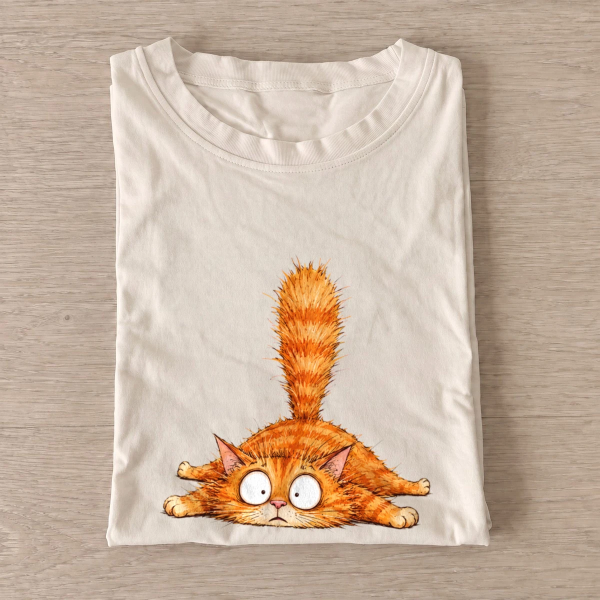 Startled orange cat t shirt sand20startled orange cat.webp