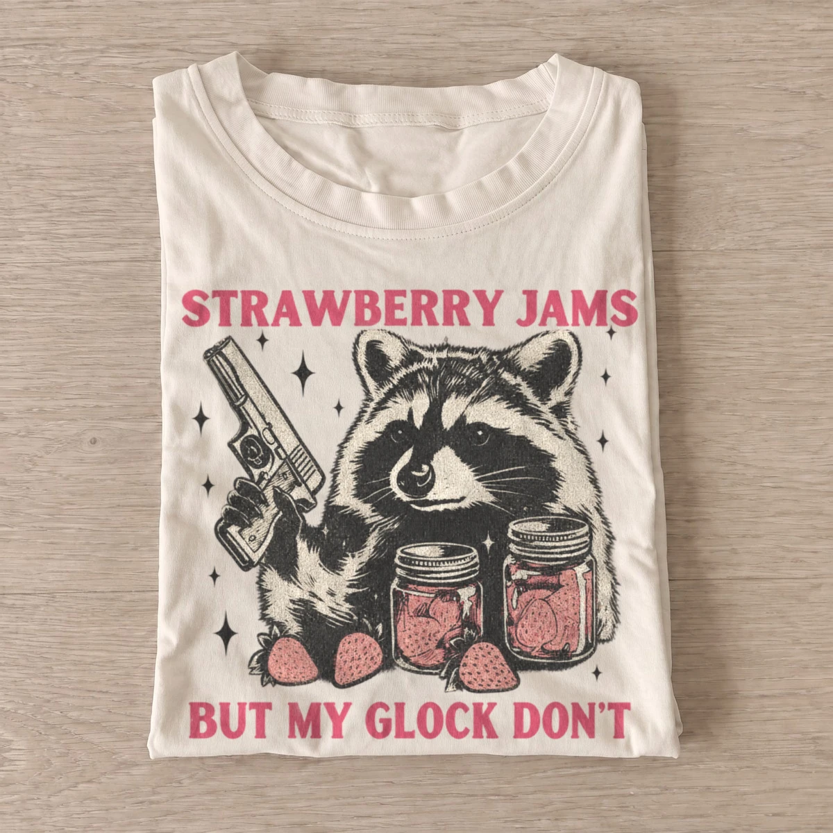 Strawberry jams but my glock dont raccoon t shirt sand20strawberry jams raccoon.webp