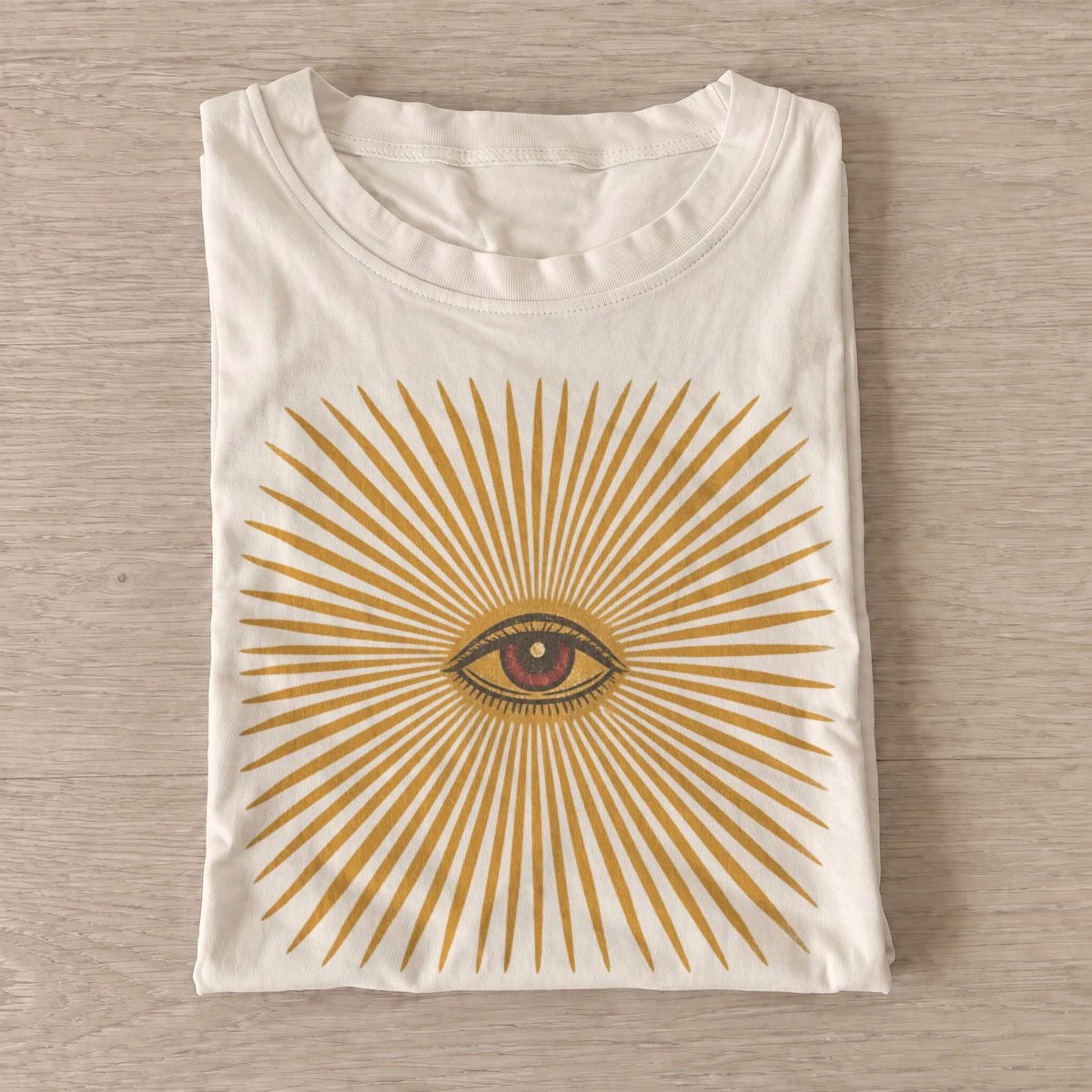 Sunburst eye graphic t shirt sand20sunburst eye.webp