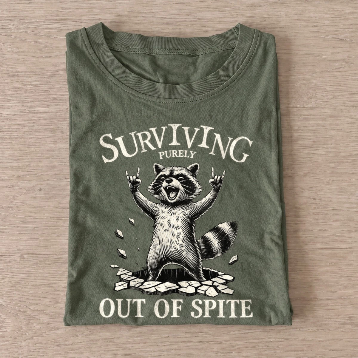Surviving purely out of spite raccoon t shirt olive20spiteful survival raccoon.webp