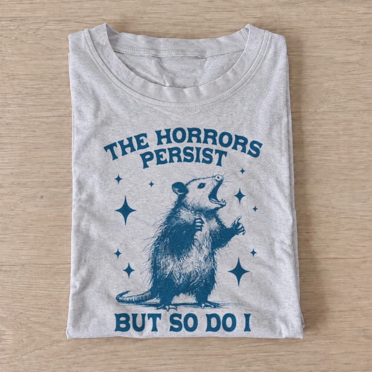 The horrors persist but so do i opossum t shirt gray20persistent horrors opossum.webp