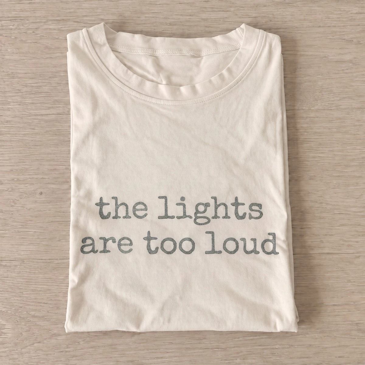 The lights are too loud t shirt sand20the lights are loud.webp
