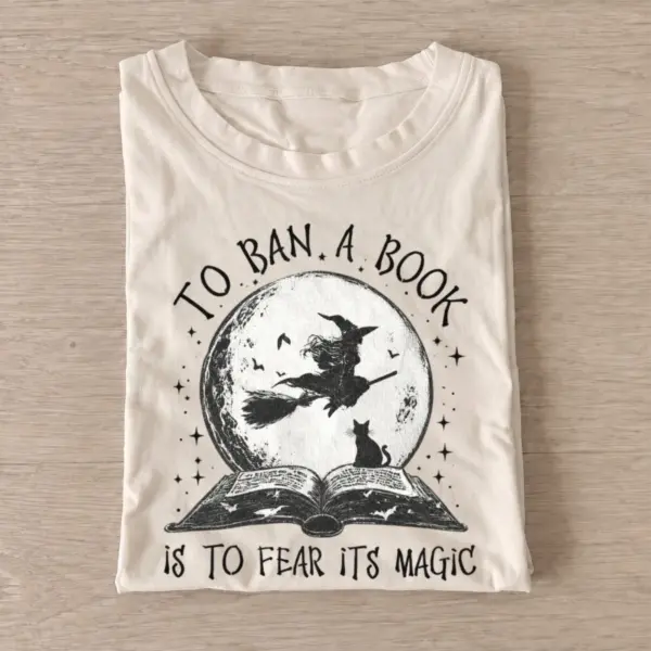 To ban a book is to fear its magic t shirt sand20book magic.webp