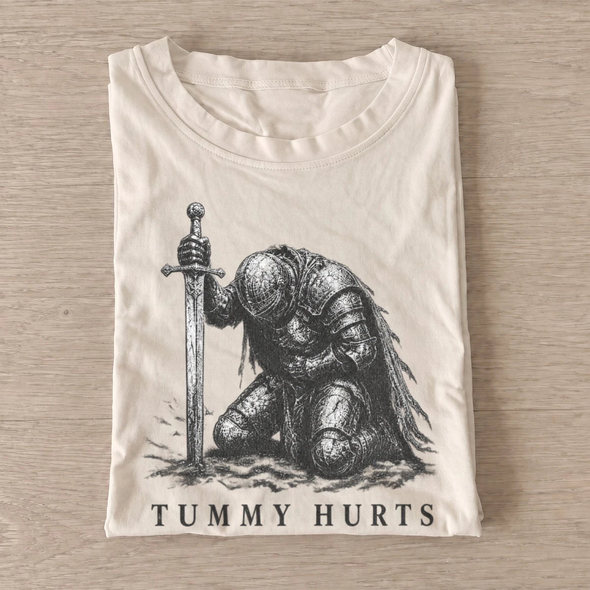 Tummy hurts knight t shirt sand20tummy hurts knight.webp