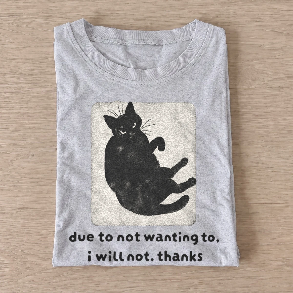 Unwilling black cat due to not wanting to t shirt gray20unwilling black cat.webp