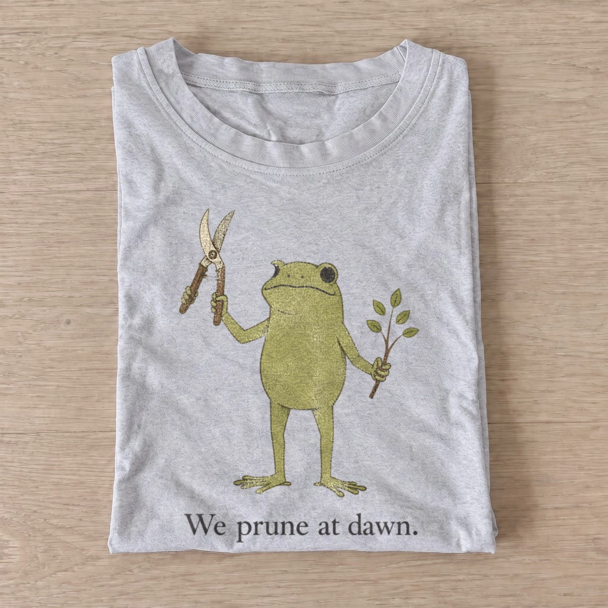 We prune at dawn gardening frog t shirt gray20prune at dawn.webp