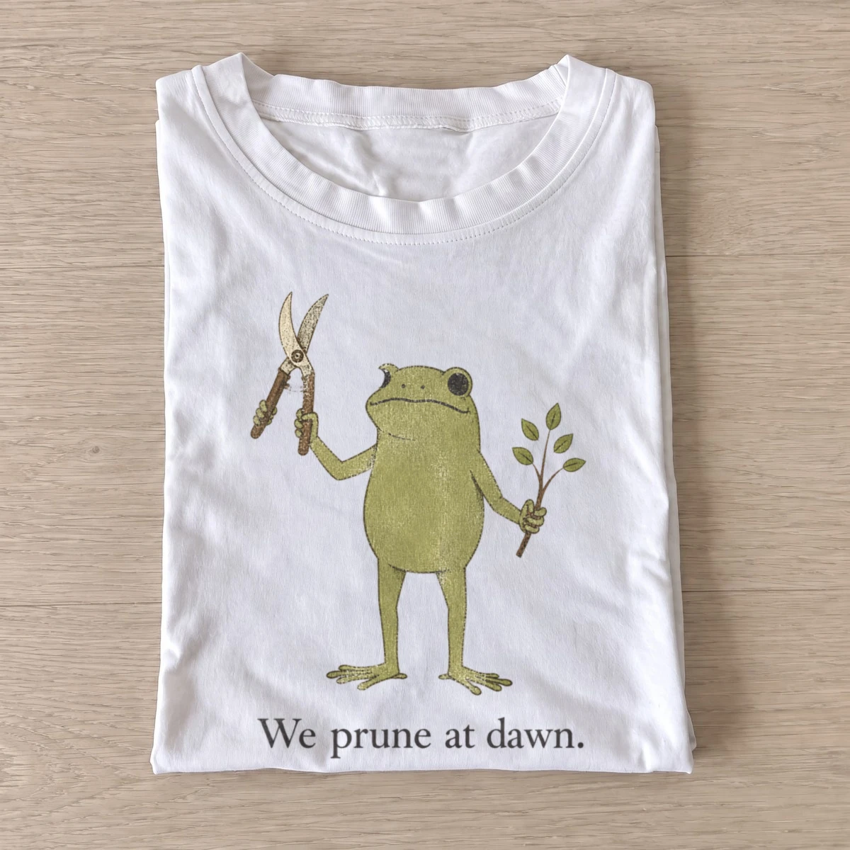 We prune at dawn gardening frog t shirt white20prune at dawn.webp