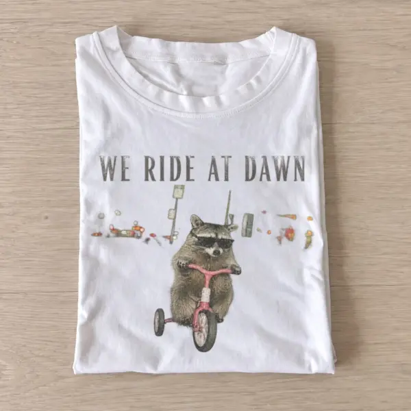 We ride at dawn raccoon t shirt white20ride at dawn raccoon.webp