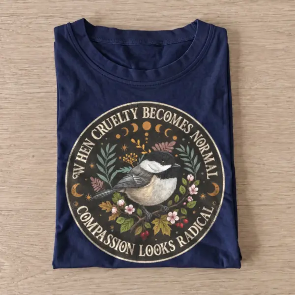 When cruelty becomes normal compassion looks radical bird t shirt navy20radical compassion bird.webp