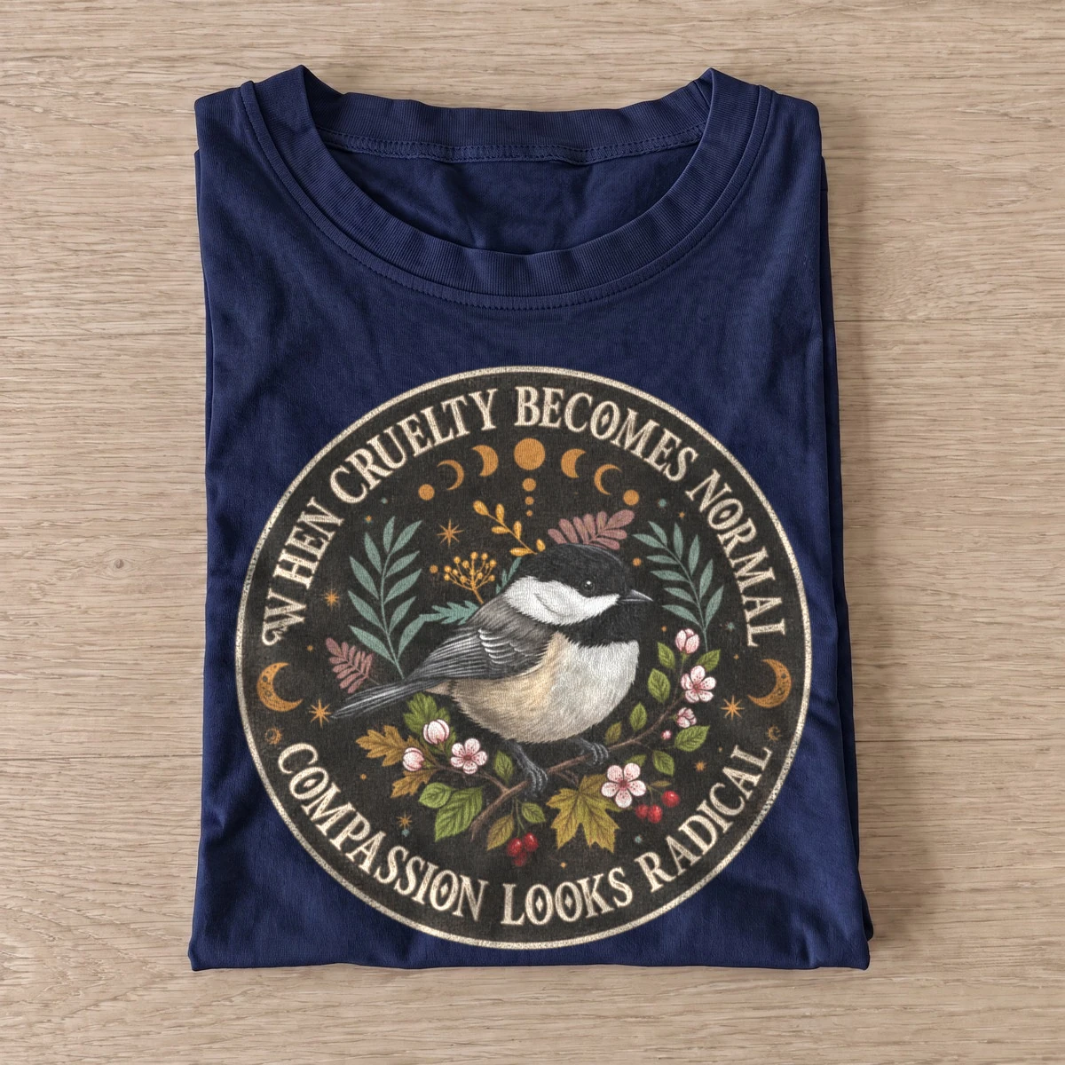 When cruelty becomes normal compassion looks radical bird t shirt navy20radical compassion bird.webp