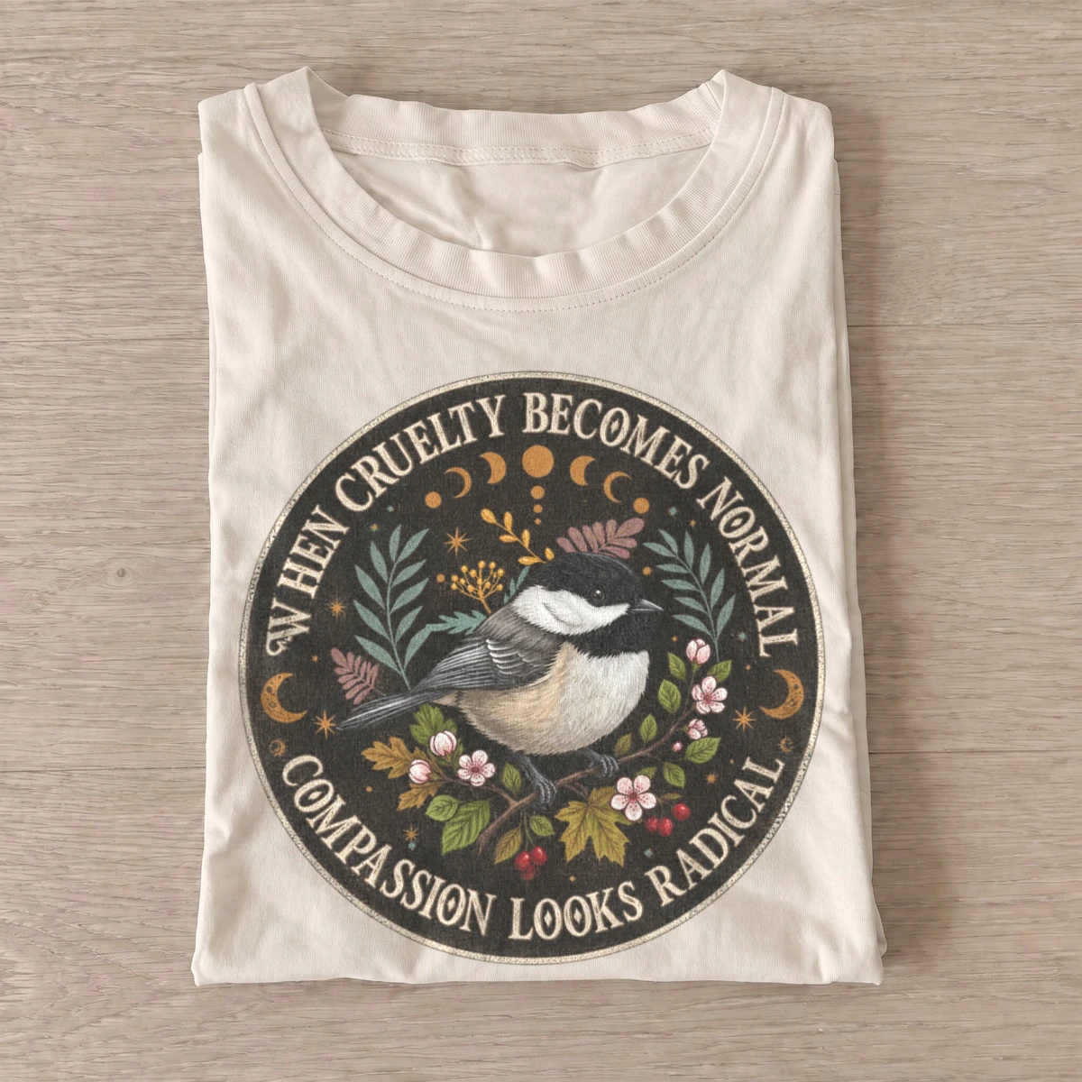 When cruelty becomes normal compassion looks radical bird t shirt sand20radical compassion bird.webp